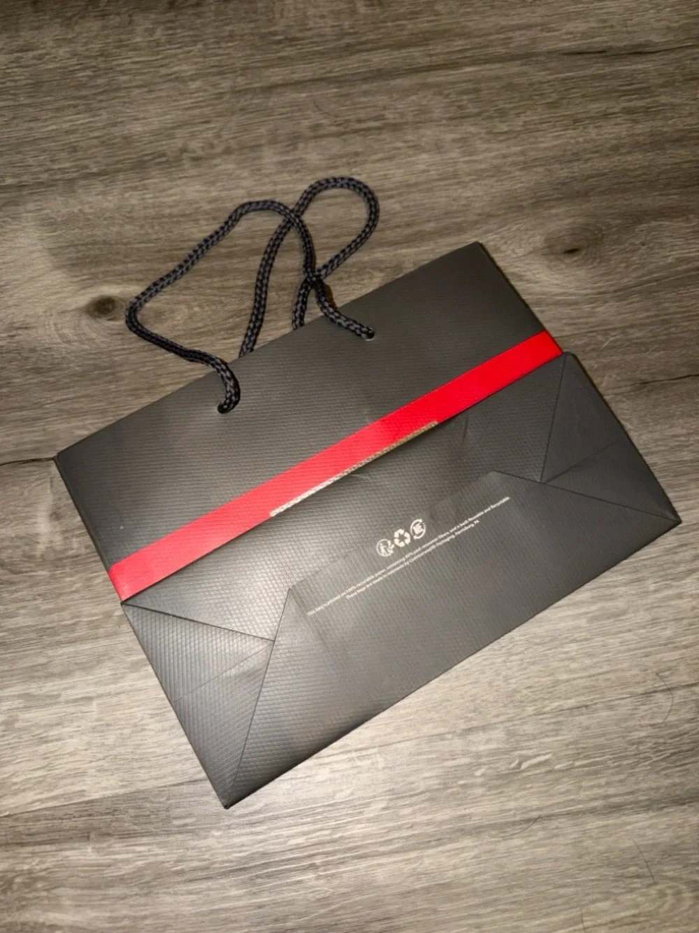 Tumi Black with Red Stripe Paper Shopping Bag
